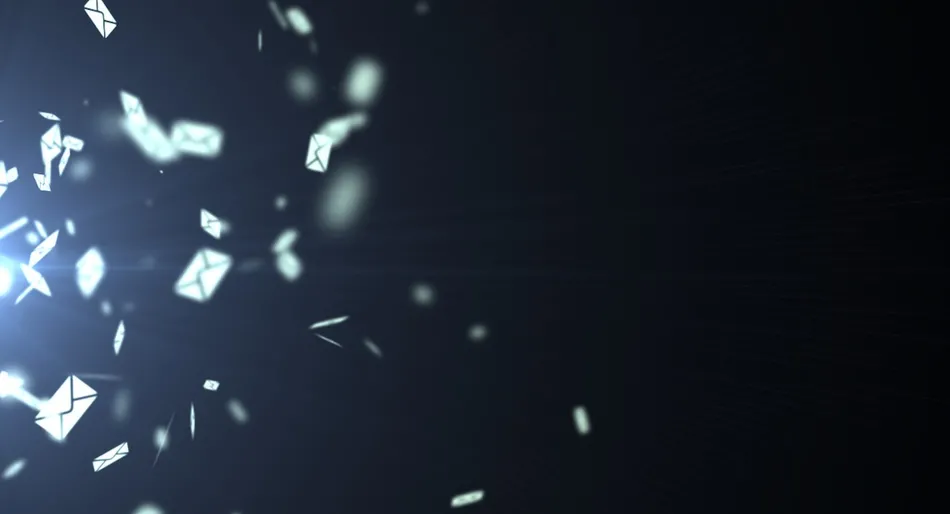 Éclats lumineux se dispersant sur fond noir.